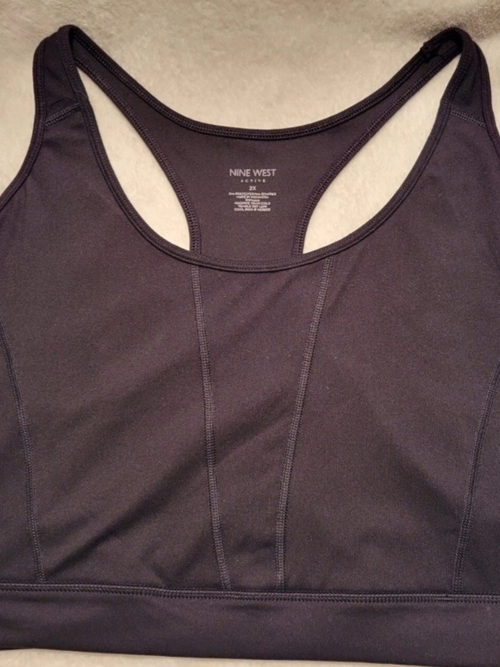 Nine West Active Plus Racerback Sports Bra. Pullover with wide elastic band.